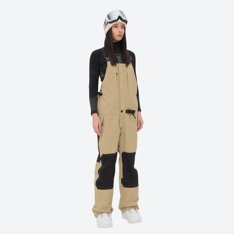 Insulated bib snow pants for women - tan bib pants, on-model front view, for skiing and snowboarding