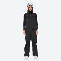 
                  
                    Insulated bib snow pants for women - black bib pants, on-model front view, for cold-weather winter sports
                  
                
