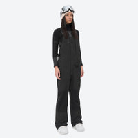 
                  
                    Women's adjustable ski pants with suspenders - black bib pants, on-model front view, for skiing and snowboarding
                  
                