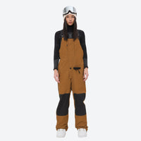 
                  
                    Women's 3L waterproof suspender snow pants - amber bib pants, on-model front view, for resort and backcountry days
                  
                