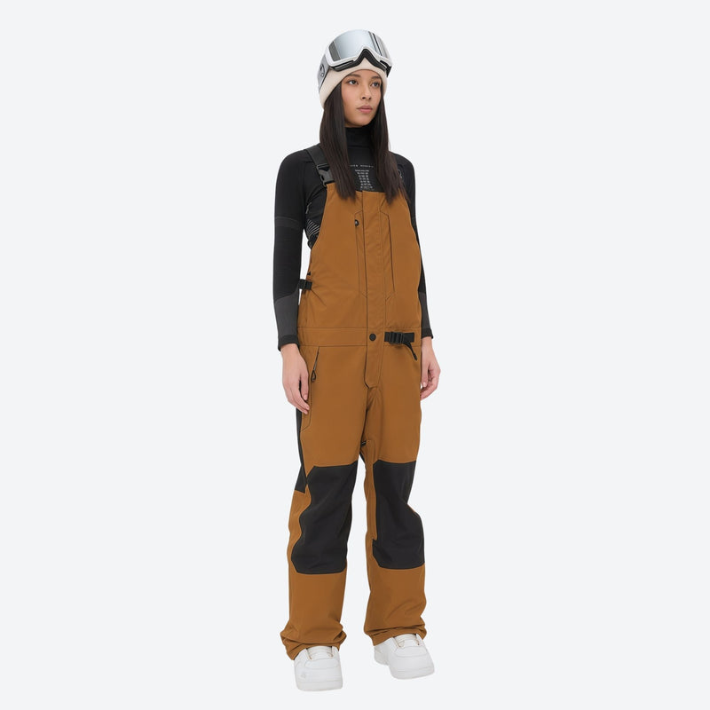 Insulated bib snow pants for women - amber bib pants, on-model front view, for deep powder winter days