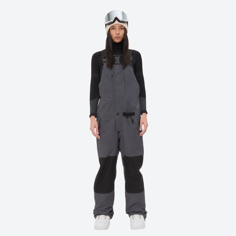 Insulated bib snow pants for women - gray bib pants, on-model front view, for resort and backcountry days