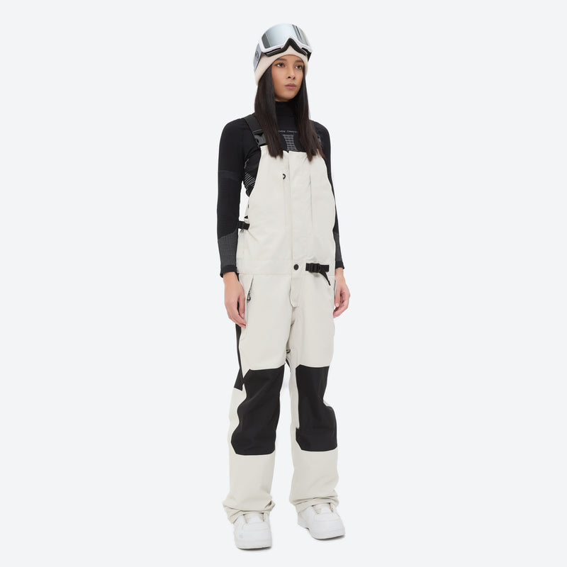 Insulated bib snow pants for women - white bib pants, on-model front view, for skiing and snowboarding