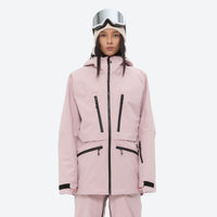 
                  
                    Insulated bib snow pants for women - pink, on-model front view, for resort and backcountry days
                  
                