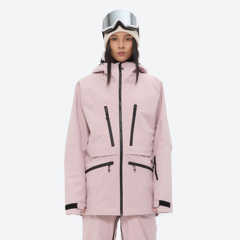 Insulated bib snow pants for women - pink, on-model front view, for resort and backcountry days