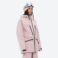 
                  
                    Women's 3L waterproof suspender snow pants - pink, on-model three-quarter front view, for cold-weather winter sports
                  
                