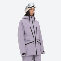 
                  
                    Women's adjustable ski pants with suspenders - lavender, on-model three-quarter front view, for resort and backcountry days
                  
                