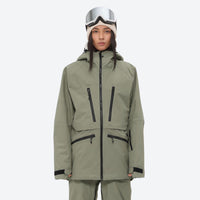 
                  
                    Insulated bib snow pants for women - olive green, on-model front view, for skiing and snowboarding
                  
                
