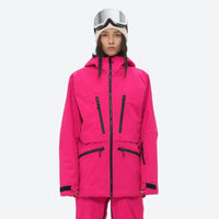 
                  
                    Insulated bib snow pants for women - magenta, on-model front view, for skiing and snowboarding
                  
                