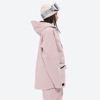 
                  
                    Insulated bib snow pants for women - pink, on-model hood side view, for skiing and snowboarding
                  
                