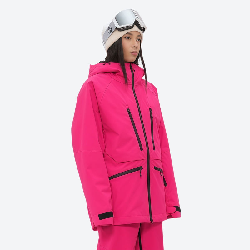 Women's adjustable ski pants with suspenders - magenta, on-model three-quarter front view, for resort and backcountry days