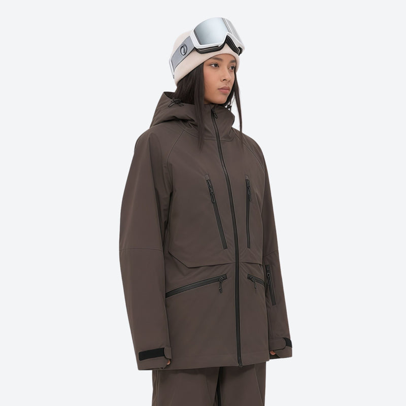 Insulated bib snow pants for women - coffee brown, on-model three-quarter front view, for cold-weather winter sports