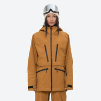 
                  
                    Women's 3L waterproof suspender snow pants - mustard amber, on-model front view, for skiing and snowboarding
                  
                