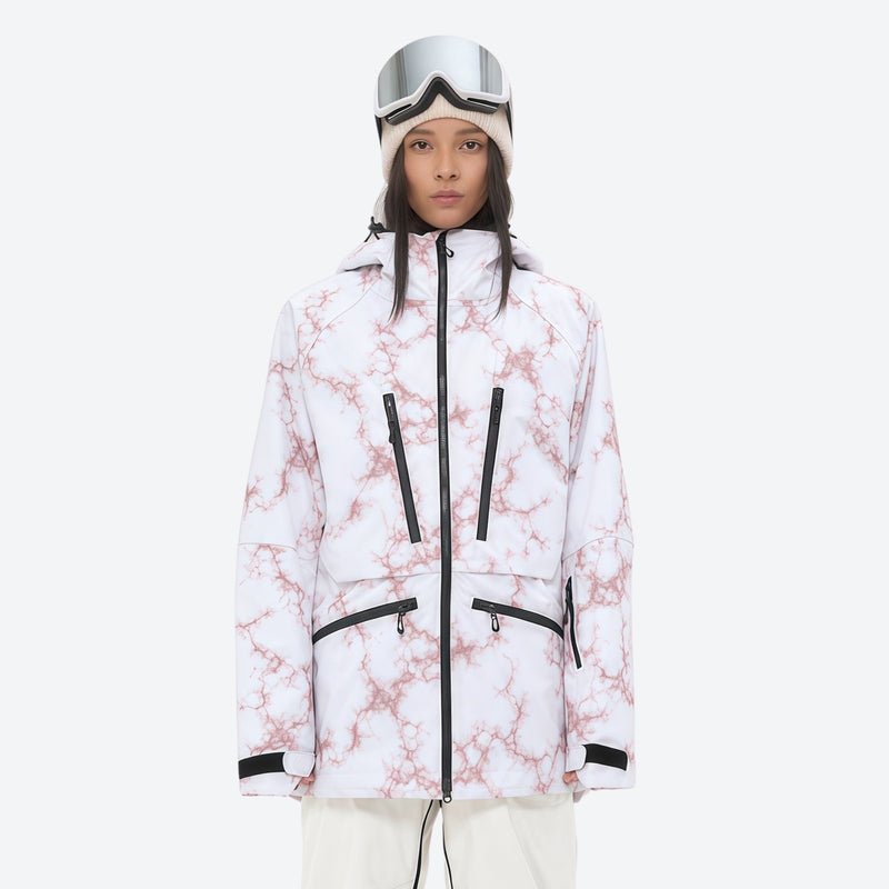 Women's adjustable ski pants with suspenders - white marble print, on-model front view, for deep powder winter days