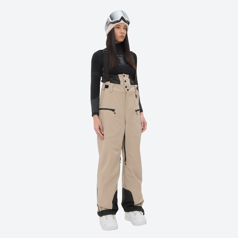 Insulated bib snow pants for women - tan bib pants, on-model front view, for cold-weather winter sports