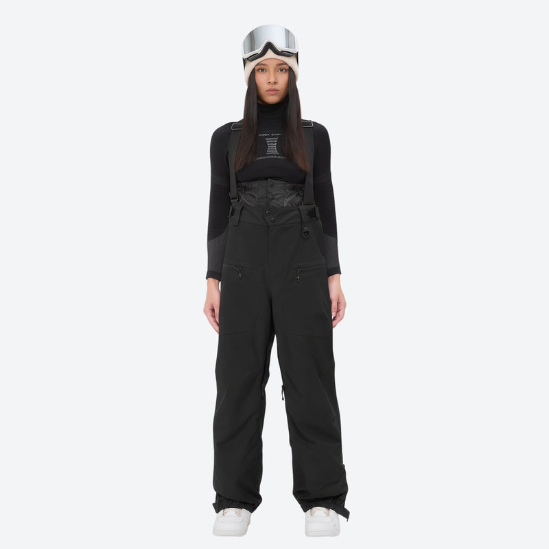 Women's 3L waterproof suspender snow pants - black bib pants, on-model front view, for skiing and snowboarding