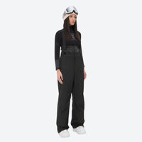 
                  
                    Insulated bib snow pants for women - black bib pants, on-model front view, for resort and backcountry days
                  
                