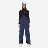 
                  
                    Women's 3L waterproof suspender snow pants - navy bib pants, on-model front view, for skiing and snowboarding
                  
                