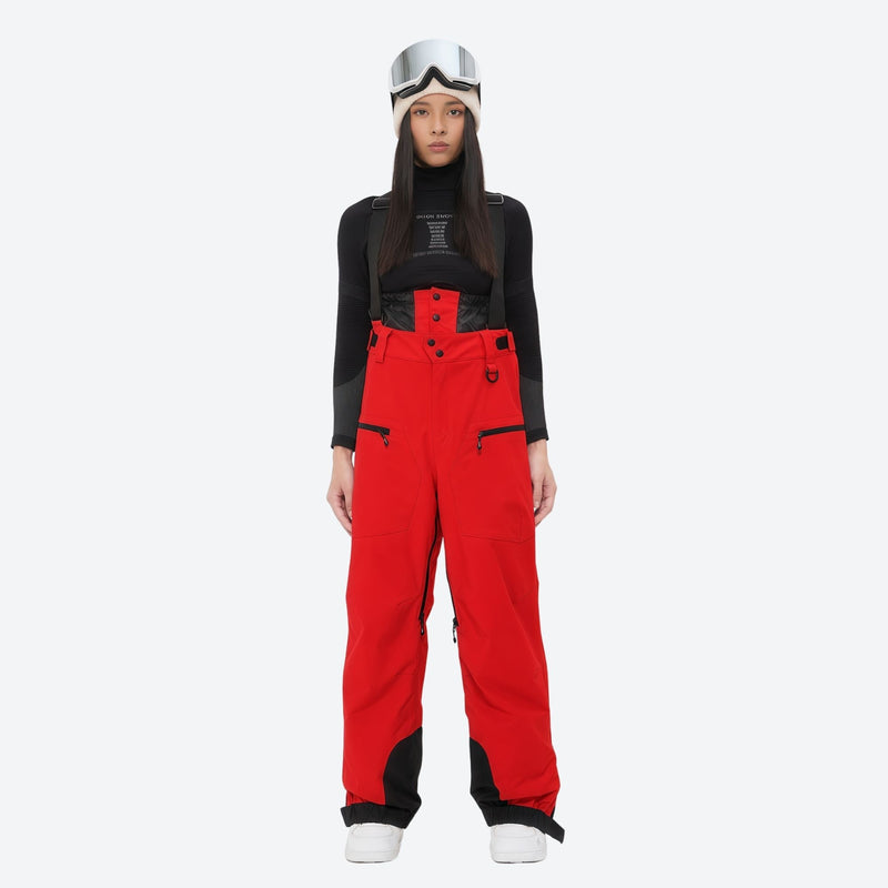 Women's adjustable ski pants with suspenders - red bib pants, on-model front view, for skiing and snowboarding