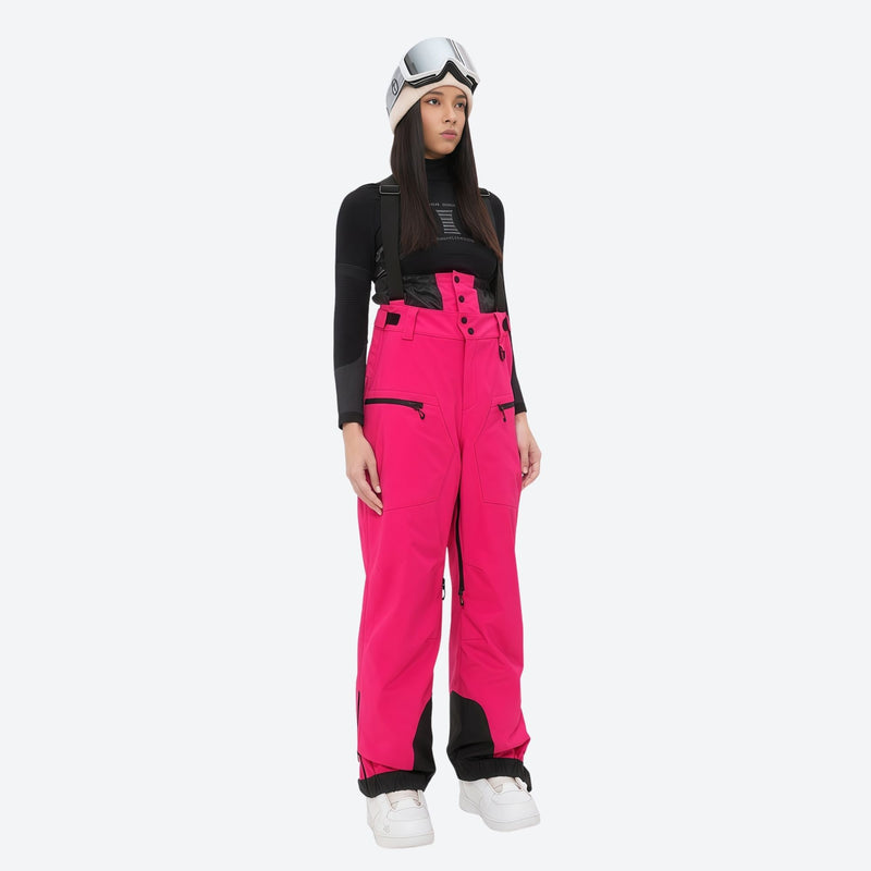 Insulated bib snow pants for women - magenta bib pants, on-model front view, for cold-weather winter sports