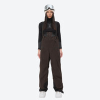 
                  
                    Women's adjustable ski pants with suspenders - coffee brown bib pants, on-model front view, for skiing and snowboarding
                  
                