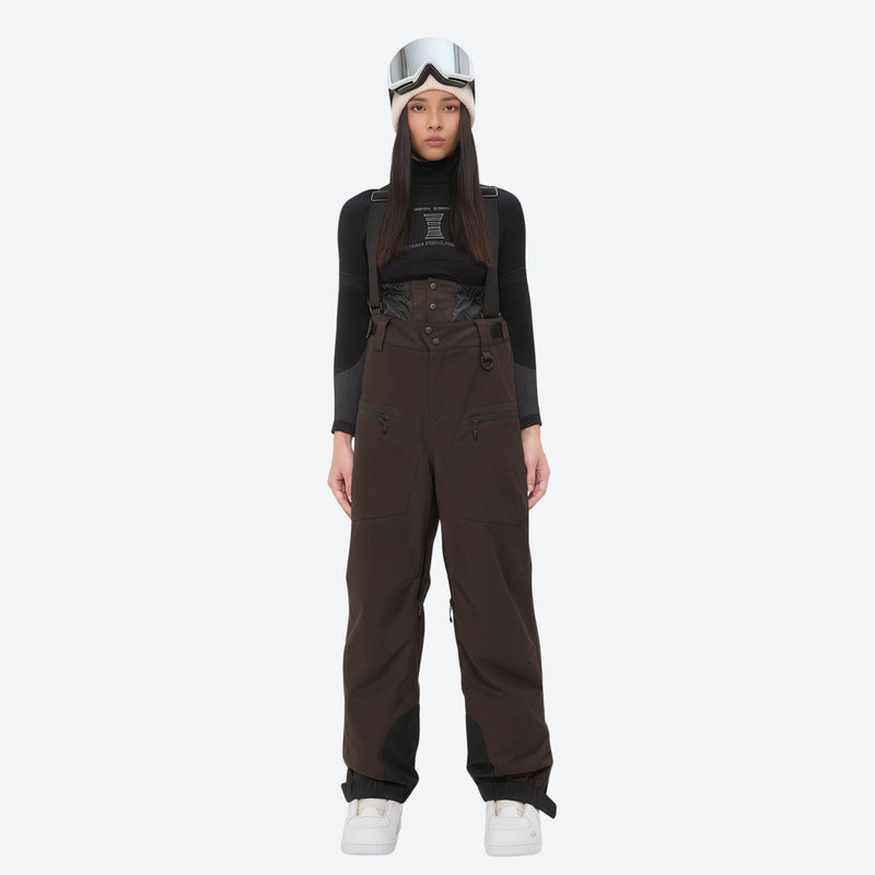 Women's adjustable ski pants with suspenders - coffee brown bib pants, on-model front view, for skiing and snowboarding
