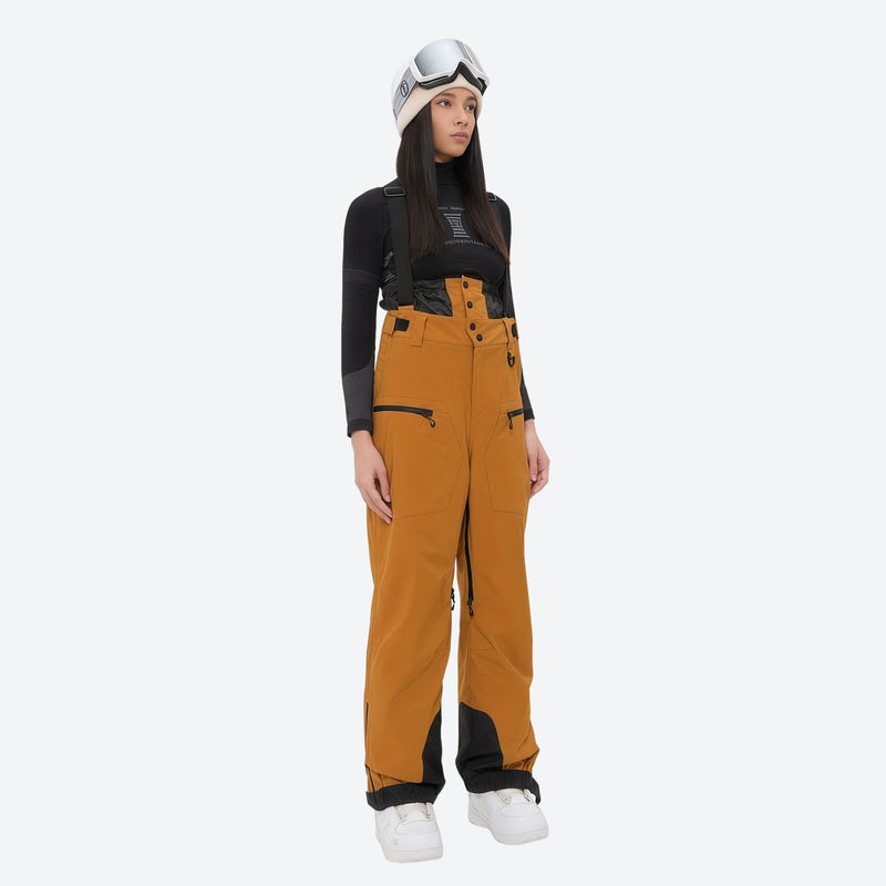 Women's 3L waterproof suspender snow pants - mustard amber bib pants, on-model front view, for cold-weather winter sports