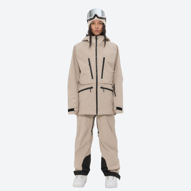 Women's adjustable ski pants with suspenders - tan, on-model front view, for skiing and snowboarding