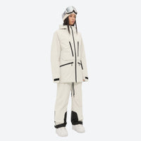 
                  
                    Women's 3L waterproof suspender snow pants - cream, on-model three-quarter front view, for cold-weather winter sports
                  
                