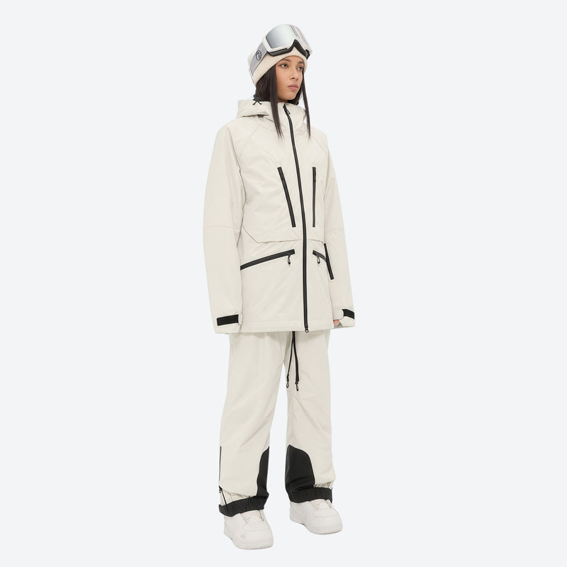 Women's 3L waterproof suspender snow pants - cream, on-model three-quarter front view, for cold-weather winter sports