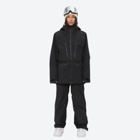 
                  
                    Women's adjustable ski pants with suspenders - black, on-model front view, for deep powder winter days
                  
                
