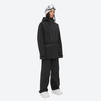 
                  
                    Women's 3L waterproof suspender snow pants - black, on-model three-quarter front view, for cold-weather winter sports
                  
                
