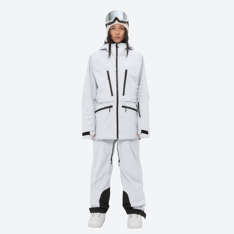 Women's adjustable ski pants with suspenders - white, on-model front view, for deep powder winter days