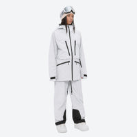 
                  
                    Women's 3L waterproof suspender snow pants - white, on-model front view, for cold-weather winter sports
                  
                