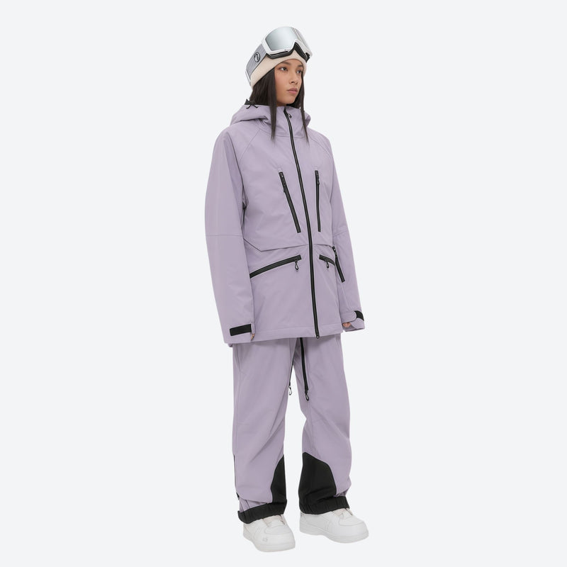 Women's 3L waterproof suspender snow pants - lavender, on-model three-quarter front view, for resort and backcountry days