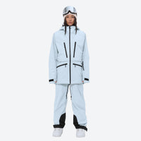 
                  
                    Women's adjustable ski pants with suspenders - ice blue, on-model front view, for skiing and snowboarding
                  
                