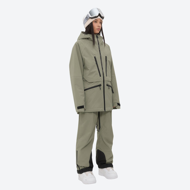 Women's 3L waterproof suspender snow pants - olive green, on-model three-quarter front view, for resort and backcountry days