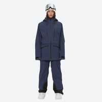 
                  
                    Women's adjustable ski pants with suspenders - navy, on-model front view, for deep powder winter days
                  
                