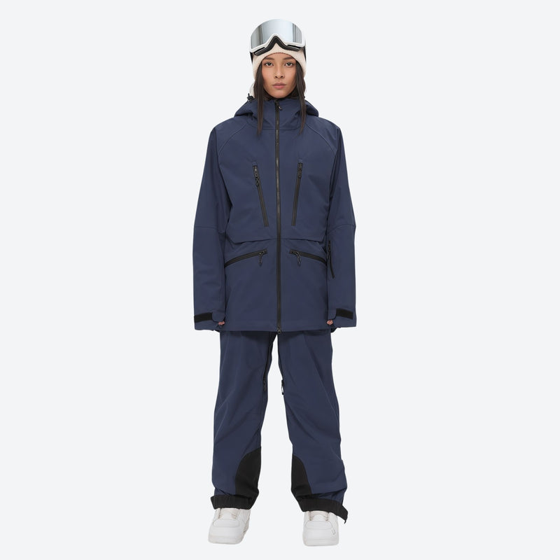 Women's adjustable ski pants with suspenders - navy, on-model front view, for deep powder winter days
