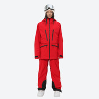 
                  
                    Insulated bib snow pants for women - red, on-model front view, for deep powder winter days
                  
                