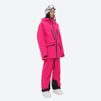 
                  
                    Women's 3L waterproof suspender snow pants - magenta, on-model hood side view, for resort and backcountry days
                  
                