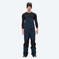
                  
                    Men's adjustable ski pants with suspenders - navy bib pants with black knee patches, for cold-weather winter sports
                  
                