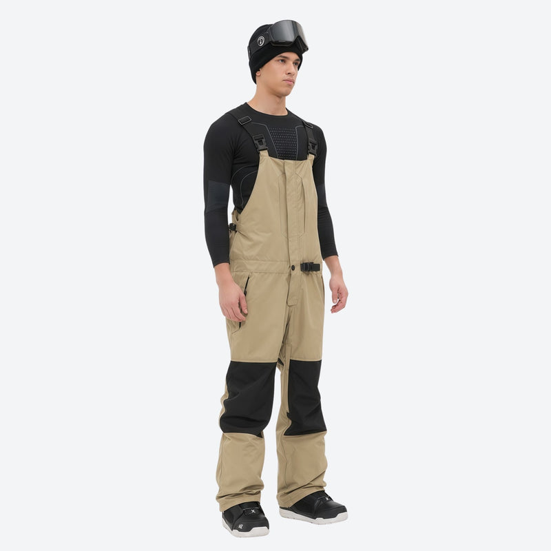 Men's adjustable ski pants with suspenders - tan bib pants with black knee patches, for deep powder winter days
