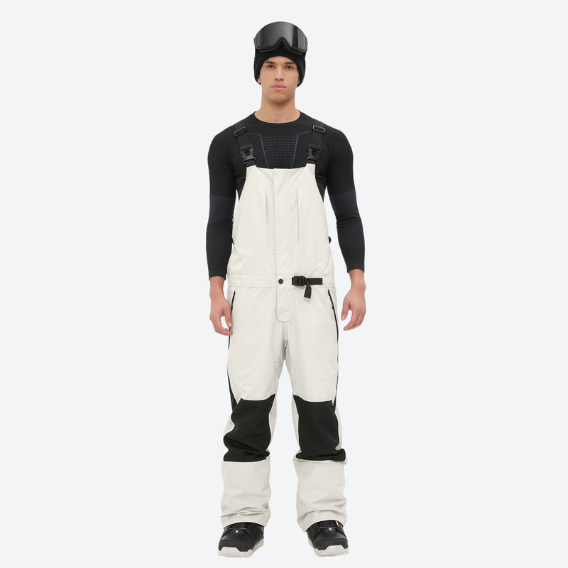 Men's adjustable ski pants with suspenders - white bib pants with black knee patches, for resort and backcountry days