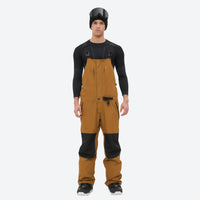 
                  
                    Insulated bib snow pants for men - amber bib pants with black knee patches, for cold-weather winter sports
                  
                