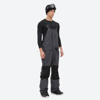 
                  
                    Insulated bib snow pants for men - gray bib pants with black knee patches, for deep powder winter days
                  
                