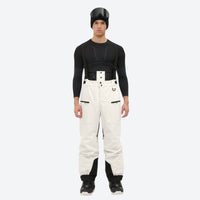 
                  
                    Insulated bib snow pants for men - cream bib pants, on-model front view, for resort and backcountry days
                  
                