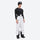 Men's adjustable ski pants with suspenders - white bib pants, on-model three-quarter front view, for deep powder winter days