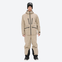 
                  
                    Insulated bib snow pants for men - tan jacket with tan pants, on-model full-body front view, for resort and backcountry days
                  
                