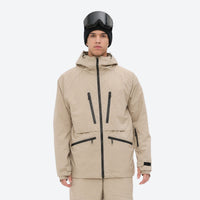 
                  
                    Men's 3L waterproof suspender snow pants - tan, on-model front view, for resort and backcountry days
                  
                